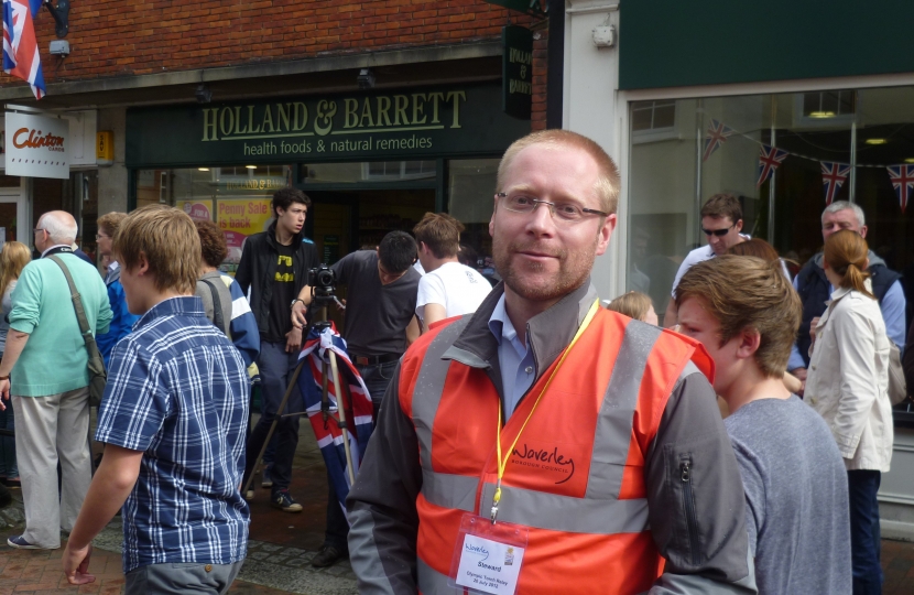 Godalming Town Councillor Paul Robinson plays his part as a steward